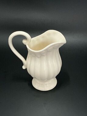 Classic White Ceramic Pitcher with Sculpted Handle